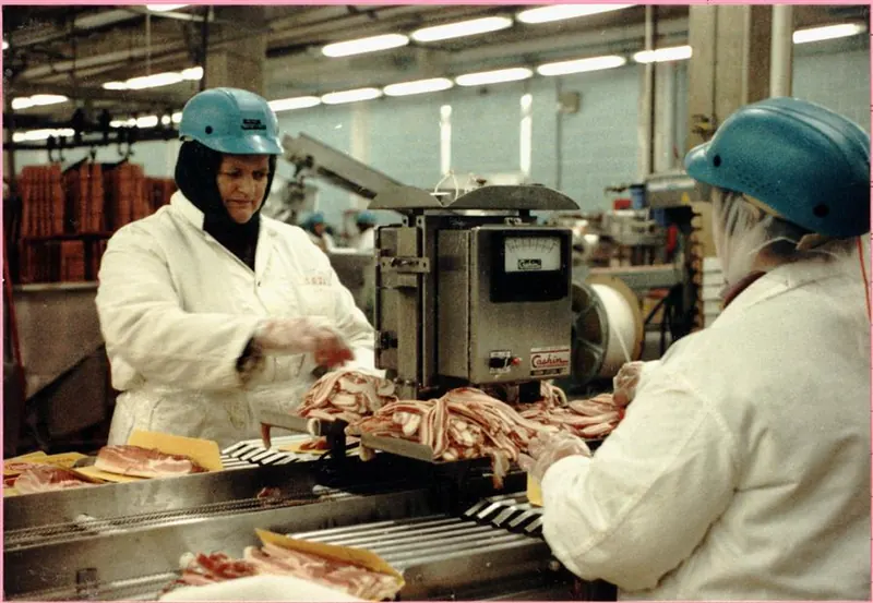 Meat processing production worker
